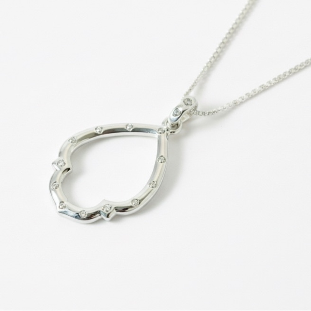 Vintage Avon (produced by SAQ Manufacturing) silver finish necklace/cz & pendant